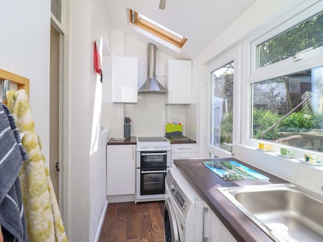 Fridge, electric kettle, toaster, cookware/dishes/utensils