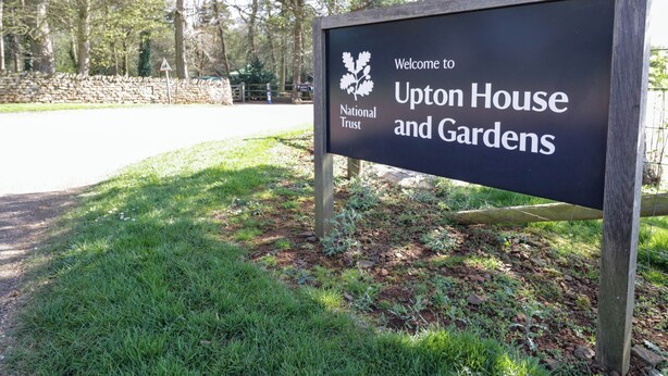 A welcome sign for Upton House and Gardens, indicating it is a National Trust property. - Oldwyche Barns (Warwick)