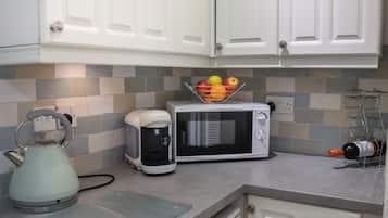Fridge, electric kettle, toaster, cookware/dishes/utensils