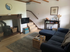 Cottage | Woonruimte | Een open haard