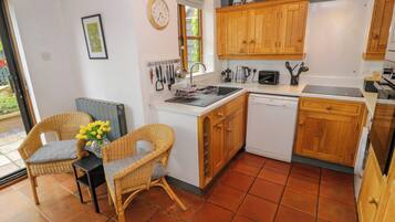 Fridge, dishwasher, electric kettle, cookware/dishes/utensils