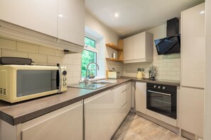 Fridge, dishwasher, electric kettle, toaster - Ullswater View Apartment (Penrith)
