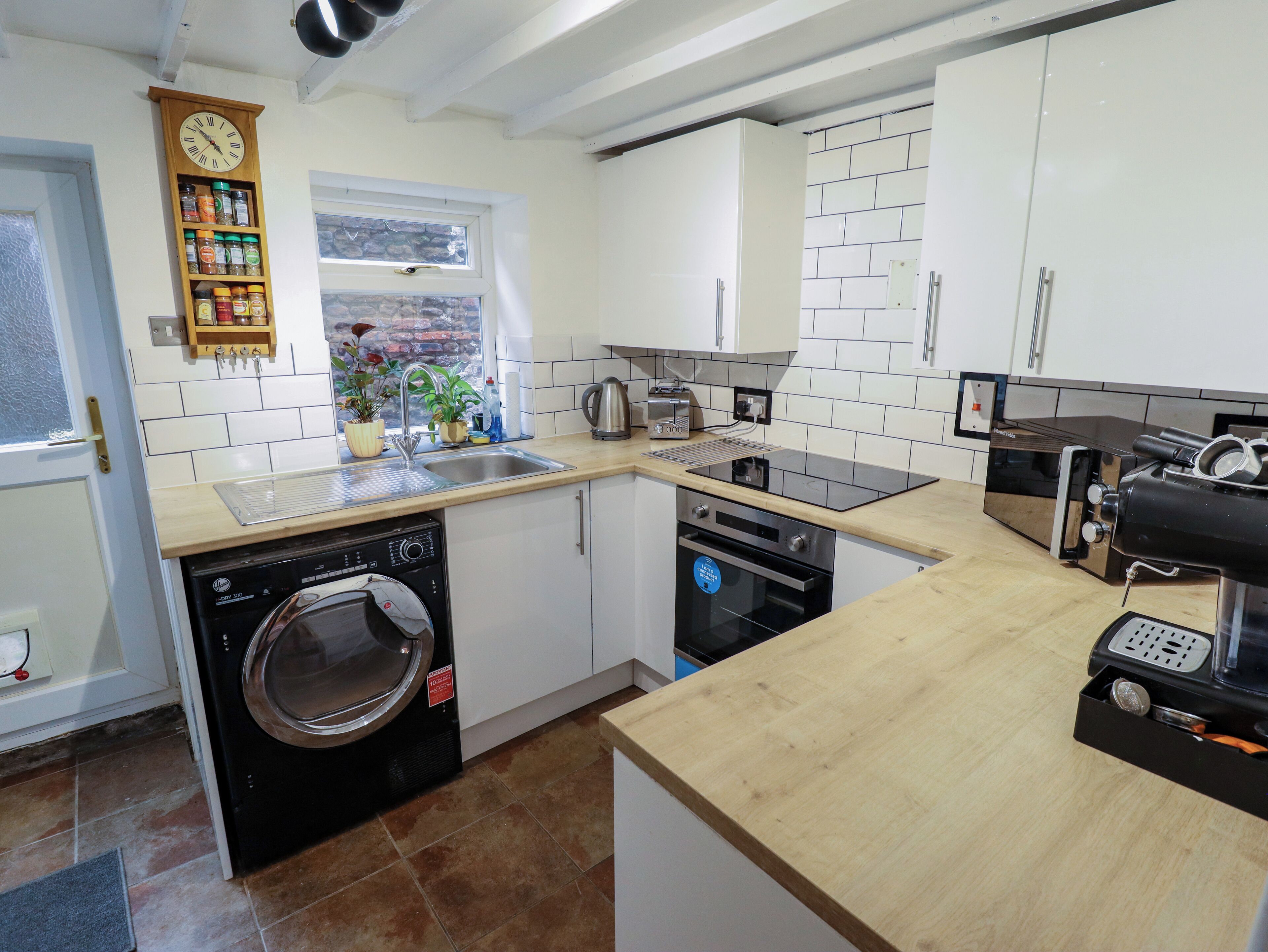 Fridge, electric kettle, toaster, cookware/dishes/utensils