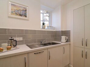 Fridge, dishwasher, electric kettle, toaster