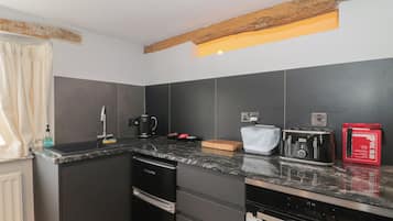 Fridge, electric kettle, toaster, cookware/dishes/utensils