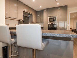 Fridge, dishwasher, electric kettle, cookware/dishes/utensils