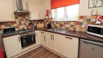 Fridge, dishwasher, cookware/dishes/utensils