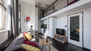 Comfort Apartment, Balcony, Courtyard View | Living area | 40-inch LCD TV with cable channels