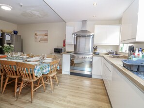 Fridge, dishwasher, electric kettle, cookware/dishes/utensils