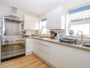 Fridge, dishwasher, electric kettle, cookware/dishes/utensils