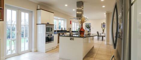 Fridge, electric kettle, toaster, cookware/dishes/utensils