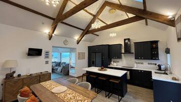 Fridge, dishwasher, electric kettle, cookware/dishes/utensils