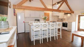 Fridge, dishwasher, electric kettle, cookware/dishes/utensils