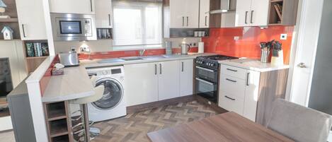 Fridge, electric kettle, toaster, cookware/dishes/utensils