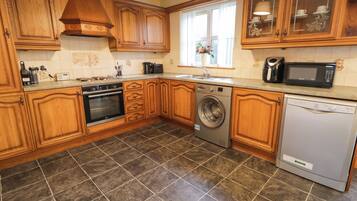 Fridge, electric kettle, toaster, cookware/dishes/utensils