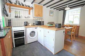 Fridge, electric kettle, toaster, cookware/dishes/utensils