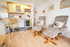 Fridge, electric kettle, toaster, cookware/dishes/utensils