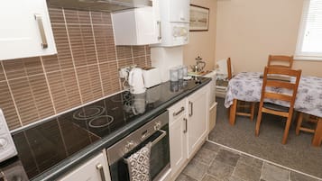Fridge, electric kettle, toaster, cookware/dishes/utensils