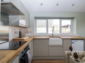 Fridge, electric kettle, toaster, cookware/dishes/utensils