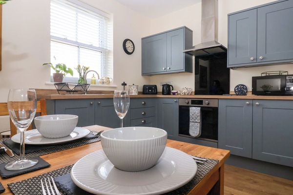 Fridge, electric kettle, toaster, cookware/dishes/utensils