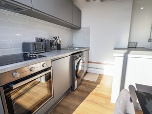 Fridge, electric kettle, toaster, cookware/dishes/utensils