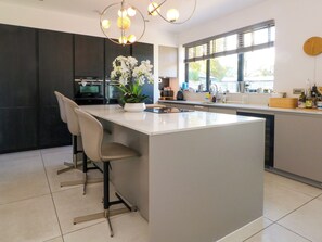 Fridge, dishwasher, cookware/dishes/utensils