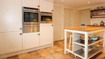Fridge, dishwasher, electric kettle, cookware/dishes/utensils