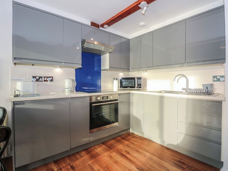 Fridge, electric kettle, toaster, cookware/dishes/utensils