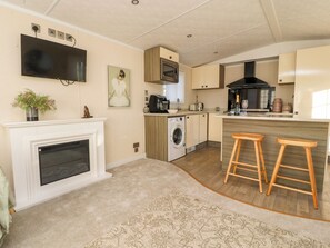 Fridge, electric kettle, toaster, cookware/dishes/utensils