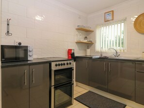 Fridge, electric kettle, toaster, cookware/dishes/utensils