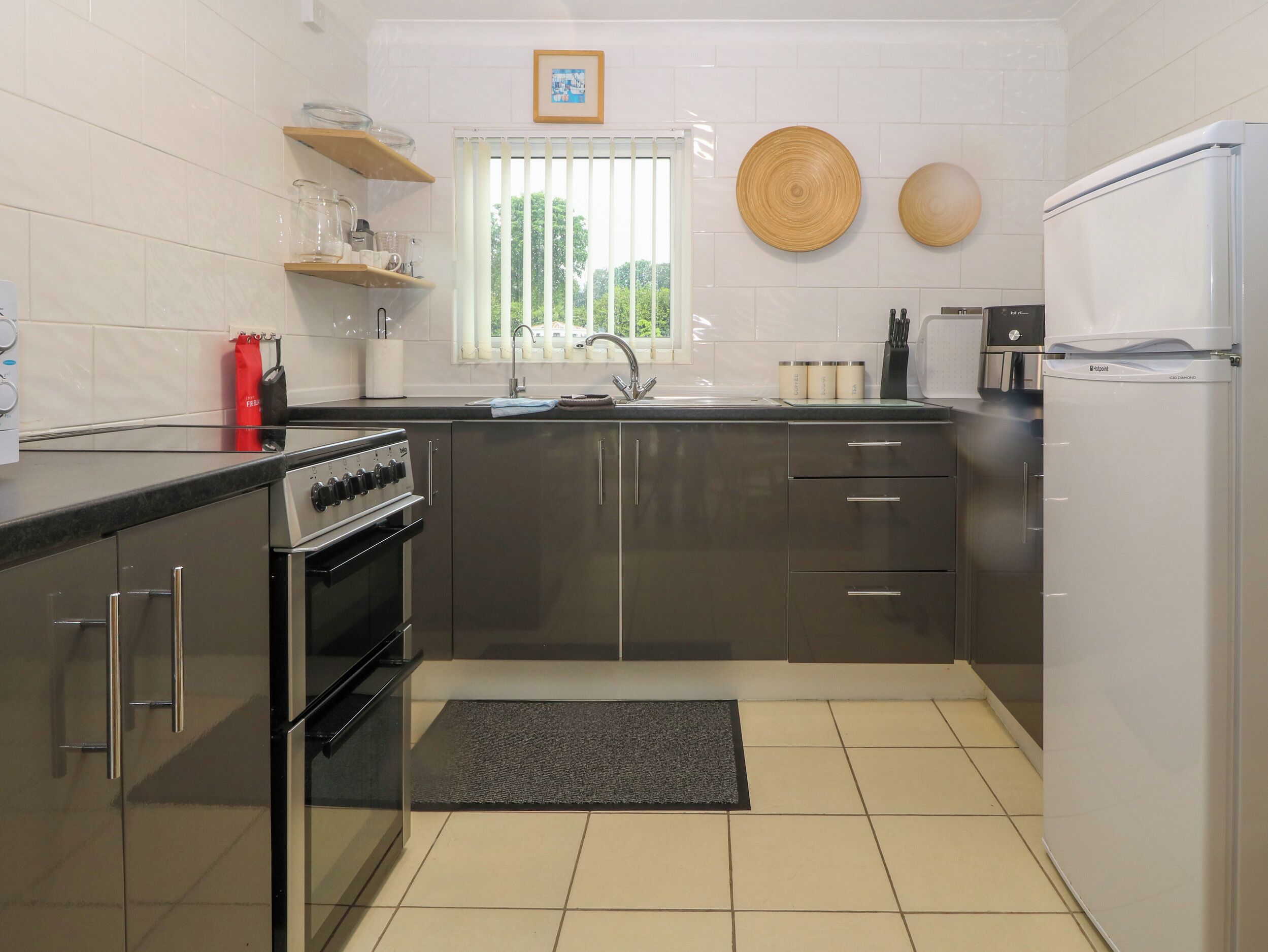 Fridge, electric kettle, toaster, cookware/dishes/utensils