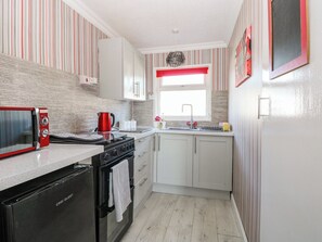 Fridge, electric kettle, toaster, cookware/dishes/utensils - 271 California Sands Estate (Great Yarmouth)