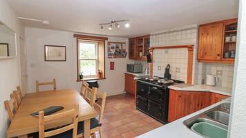 Fridge, electric kettle, toaster, cookware/dishes/utensils