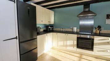 Fridge, dishwasher, electric kettle, cookware/dishes/utensils