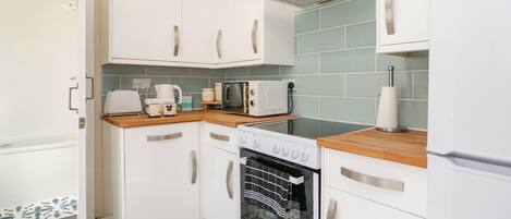 Fridge, dishwasher, electric kettle, cookware/dishes/utensils