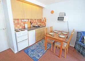 Fridge, electric kettle, toaster, cookware/dishes/utensils