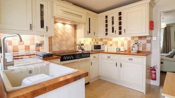 Fridge, electric kettle, toaster, cookware/dishes/utensils