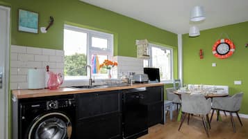 Fridge, dishwasher, cookware/dishes/utensils