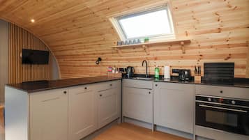 Fridge, electric kettle, toaster, cookware/dishes/utensils
