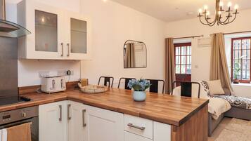 Fridge, electric kettle, toaster, cookware/dishes/utensils