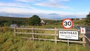 A rural road sign with a speed limit of 30, a thank you sign for driving carefully, and a sign warning of red squirrels. - Middlefell View Cottage (Alston)