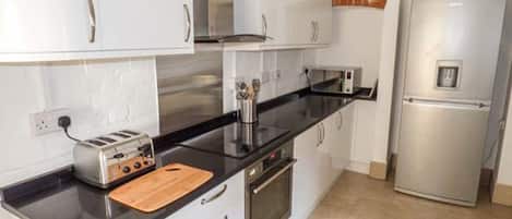 Fridge, dishwasher, cookware/dishes/utensils