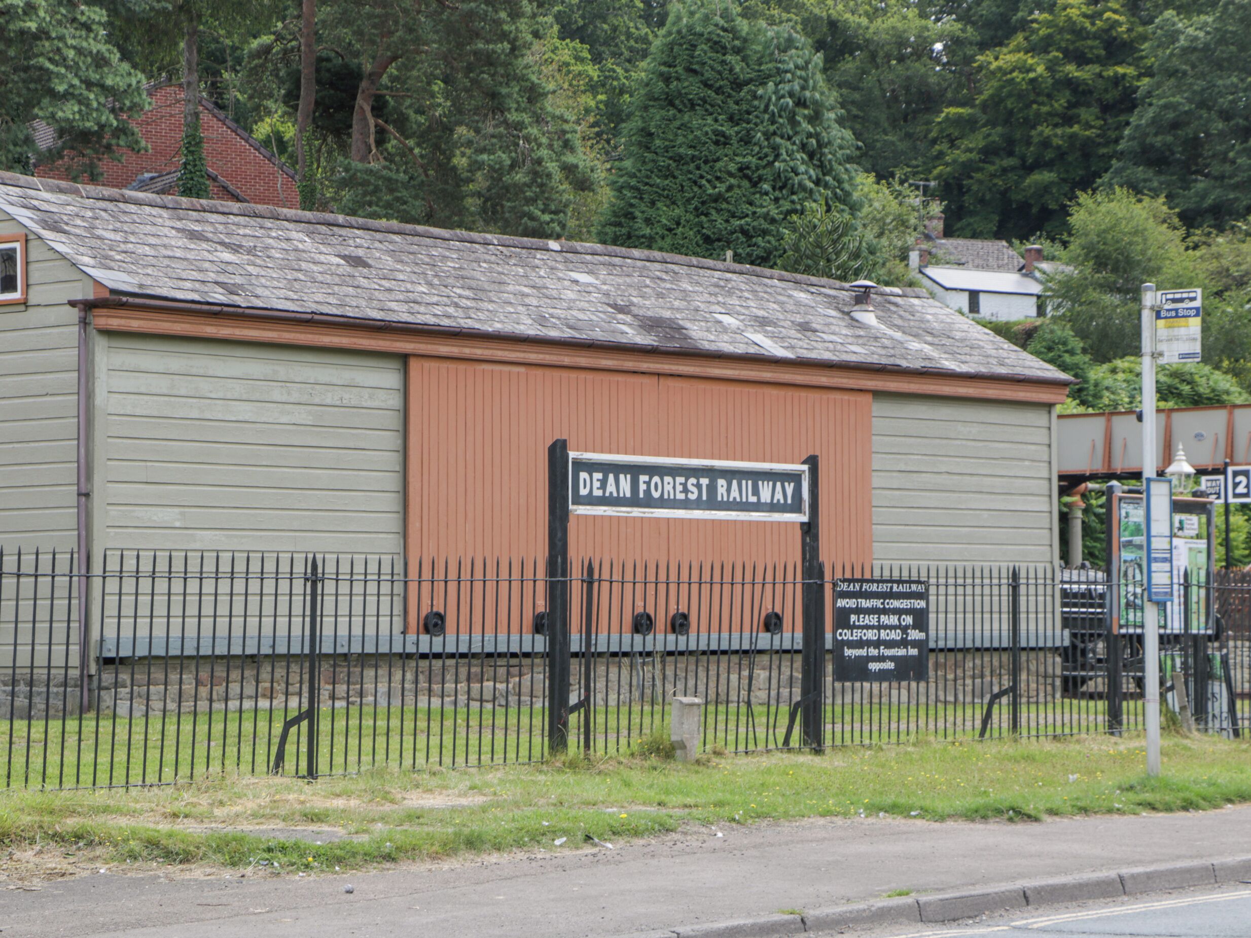 A building labeled 'Dean Forest Railway' with a sign indicating parking on Coleford Road.