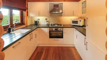 Fridge, dishwasher, electric kettle, cookware/dishes/utensils