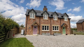 Cottage | Façade de l’hébergement