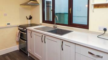 Fridge, electric kettle, toaster, cookware/dishes/utensils