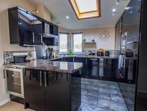 Fridge, dishwasher, electric kettle, cookware/dishes/utensils