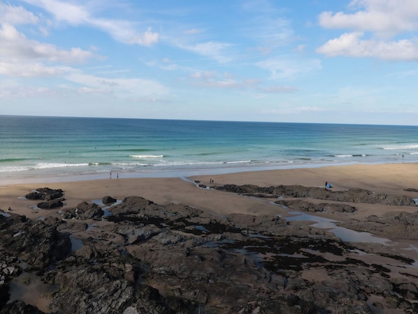 Enjoy a serene beach experience with access to the ocean and scenic views of the coastline.