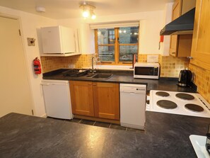 Fridge, electric kettle, toaster, cookware/dishes/utensils