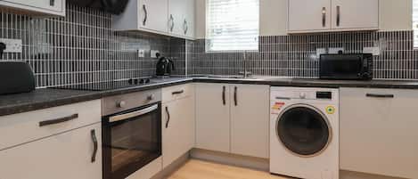 Fridge, dishwasher, electric kettle, toaster